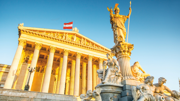 statue in front of historical monument in vienna